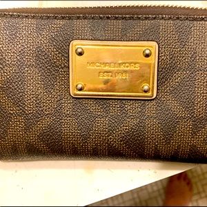 Mk michael kors wallet i have the matching purse up for sale to